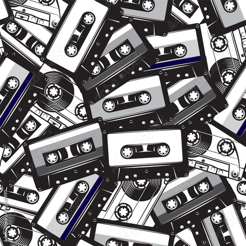 A set of different audio cassettes. Seamless background in retro style. Vector illustration