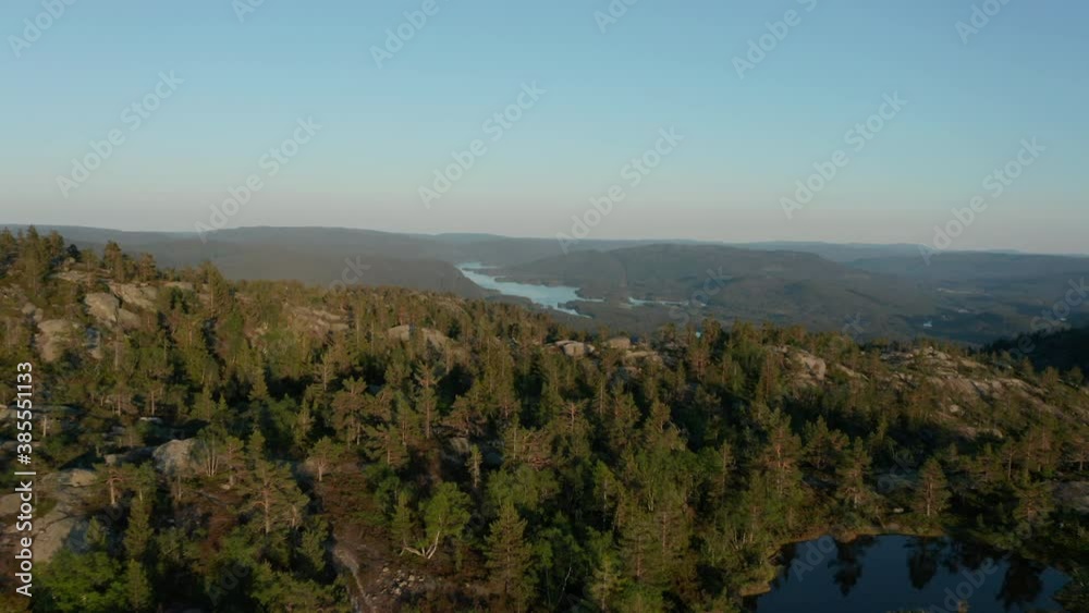 Aerial Drone Shot Flying over Picturesque Norwegian Mountains with Alpine Lake Aerial Drone Shot Flying over Picturesque Norwegian Mountains with Alpine Lake