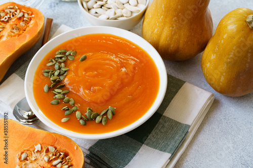 Close up photo of pureed pumpkin soup with pumpkin seeds