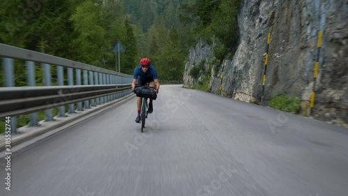 Wallpaper Mural Stabilized action shot of a Cyclist in high speed through the mountains Torontodigital.ca