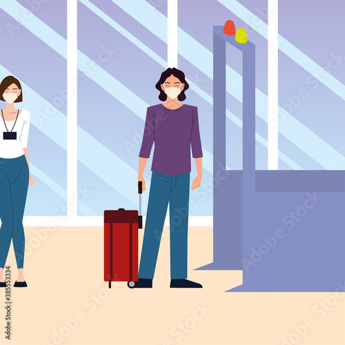 airport new normal, people wear medical mask and keep distance at tickets counter queues