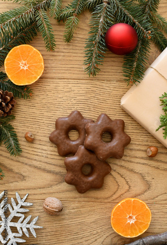 Composition with tasty Christmas cookies on wooden background.