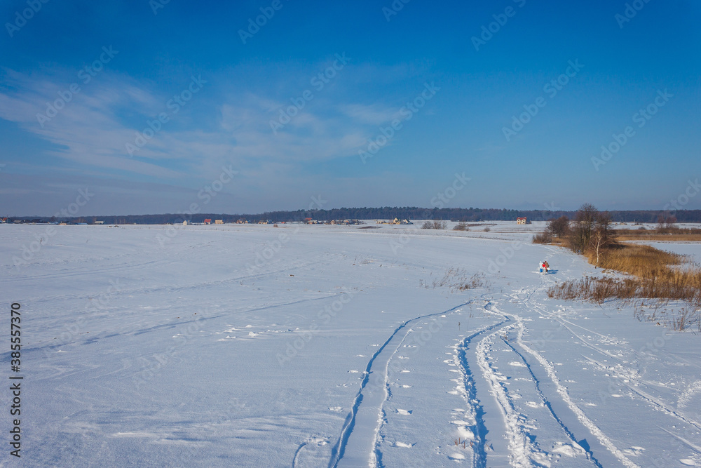 Winter landscape. Footprints in the snow. Background