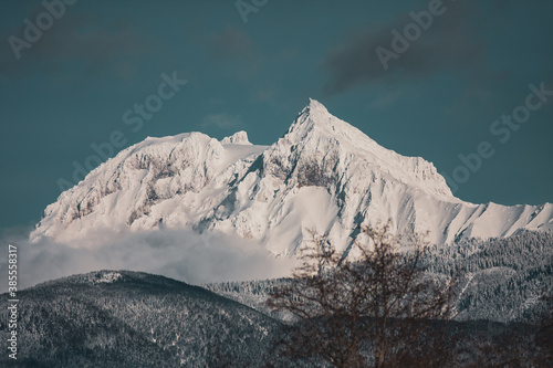 Distant snowy epic mountain in a beautiful town in Canada.