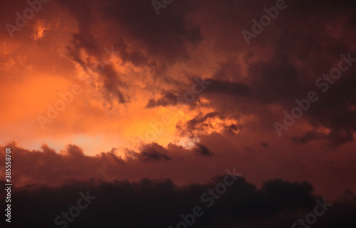 Fototapeta Naklejka Na Ścianę i Meble -  Cloudscape. Dramatic sunset sky and clouds with beautiful red, black, yellow and orange colors.