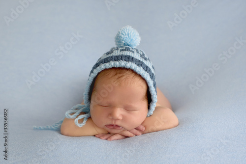  Beautiful newborn sleeping with knitted hat 