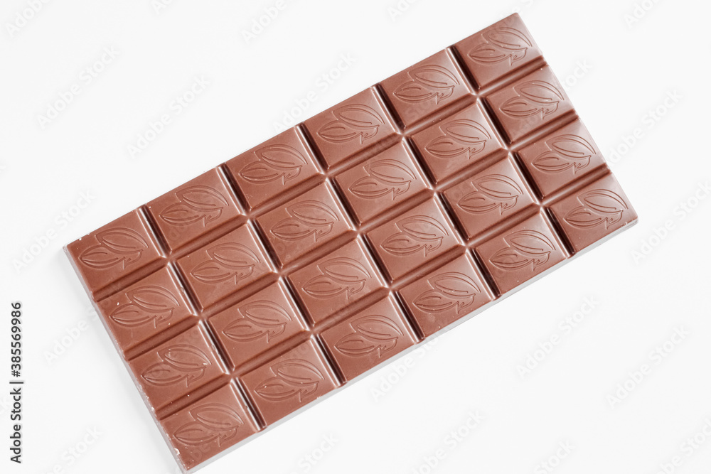 Milk chocolate bar isolated on white background Milk chocolate bar isolated on white background