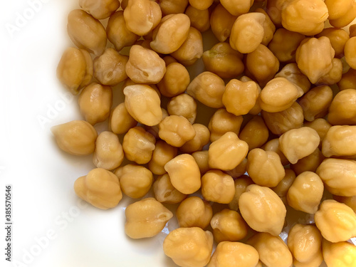 Garbanzo beans or pois chiche or chickpea spread on an isolated white background