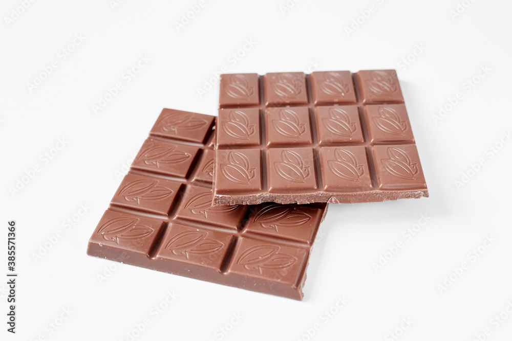 close up a chocolate bar isolated on white background close up a chocolate bar isolated on white background