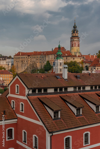 Cesky Krumlov old town with Vltava river and bridges in autumn color morning