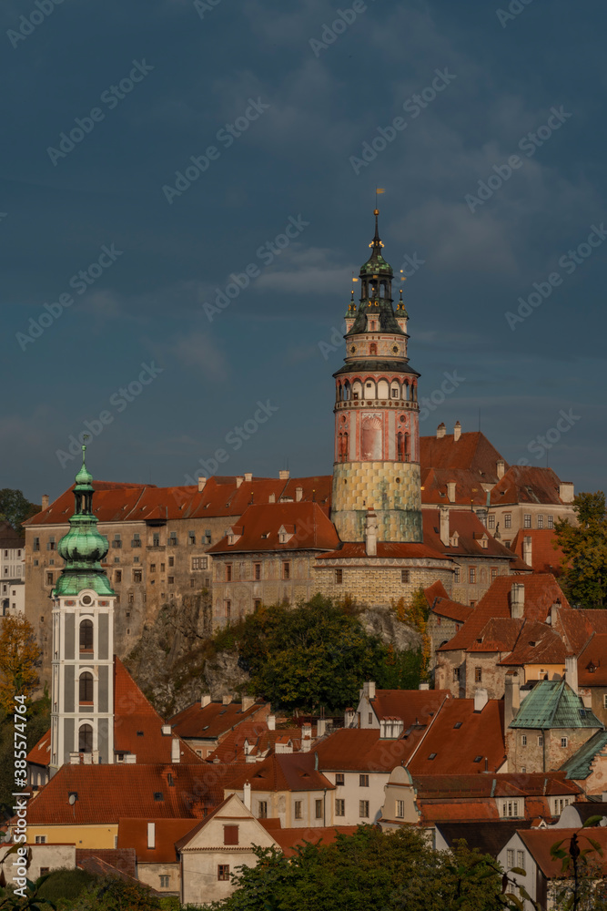 Cesky Krumlov old town with Vltava river and bridges in autumn color morning