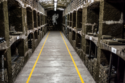 old bottles with wine stored in special cellars and stored using special technology