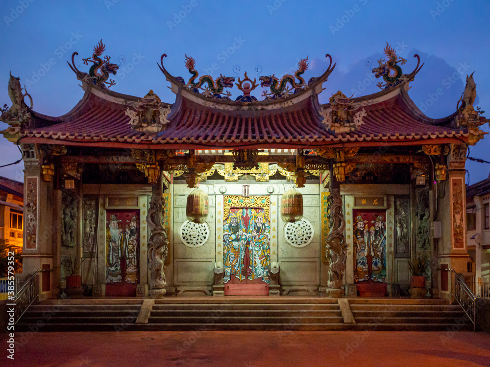 Penang taoist temple art and architecture. God and dragon statues and paintings. Malaysia