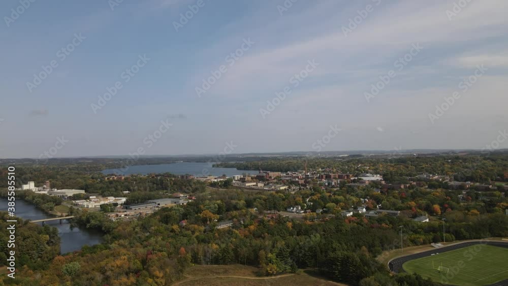 Aerial view of athletic stadium and industrial city center of Menomonie, Wisconsin Aerial view of athletic stadium and industrial city center of Menomonie, Wisconsin