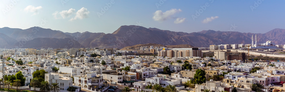 A panorama view across Muscat, Oman towards the distant mountains in late summer