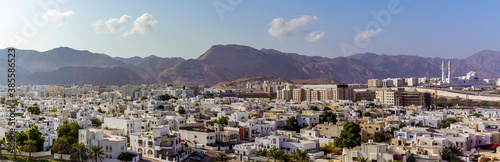 A panorama view across Muscat, Oman towards the distant mountains in late summer