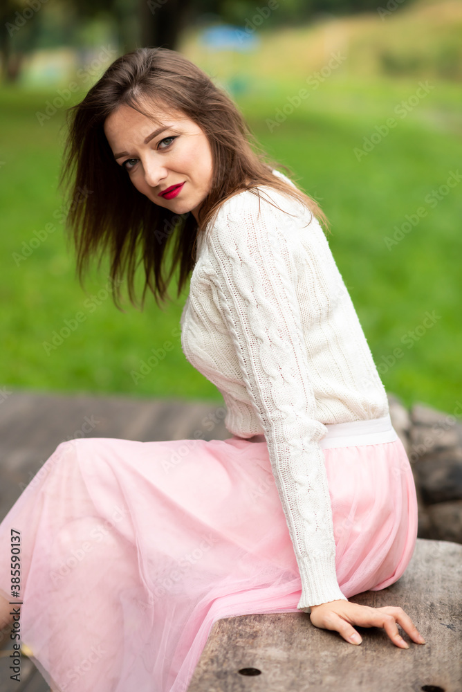 Portrait of a girl on a Park bench. Portrait of a girl on a Park bench.