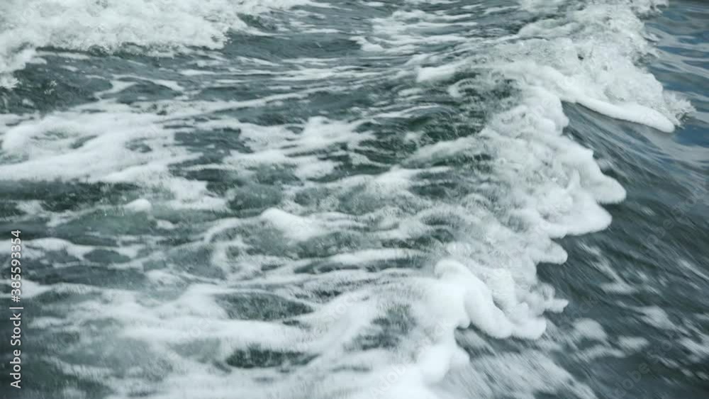Wake from Boat Splashing in Slow Motion during Cruise of the Galapagos Islands Wake from Boat Splashing in Slow Motion during Cruise of the Galapagos Islands