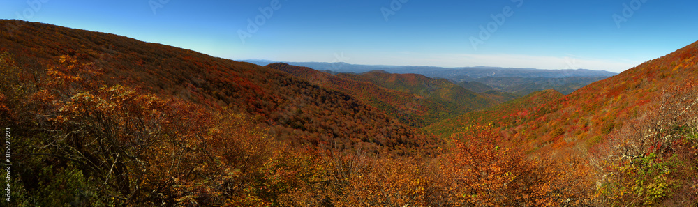 A beautiful panoramic view of a mountain overlook on the Blue Ridge Parkway in North Carolina in the fall of the year.