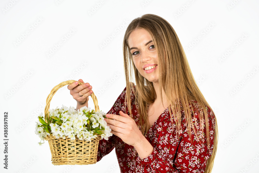 spring blossom arrangement. beautiful summer bloom. female florist designer. womens and mothers day. girl at flower shop. natural gift. happy woman carry flowers in basket spring blossom arrangement. beautiful summer bloom. female florist designer. womens and mothers day. girl at flower shop. natural gift. happy woman carry flowers in basket