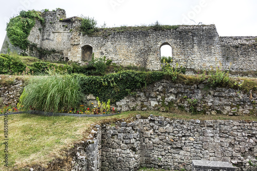 Ruins of Ducal Palace in Fecamp. Once belonging to Dukes of Normandy, castle built in X century. Fortified compound located at bottom of cove. Fecamp, Haute-Normandie region, France. photo