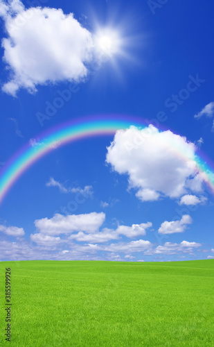 草原と虹と太陽