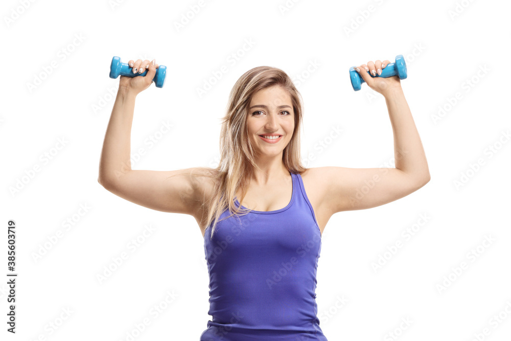 Sporty female lifting dumbbells and smiling Sporty female lifting dumbbells and smiling