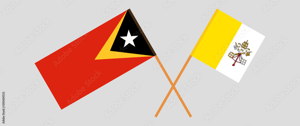 Crossed flags of East Timor and Vatican Crossed flags of East Timor and Vatican