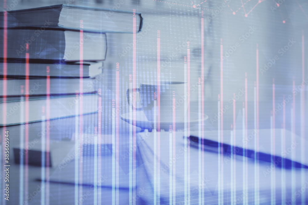 Double exposure of financial chart drawing and desktop with coffee and items on table background. Concept of forex market trading Double exposure of financial chart drawing and desktop with coffee and items on table background. Concept of forex market trading