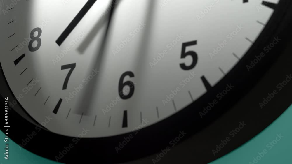 Clock Face in Time Lapse on Cyan Aquamarine Celadon Sea-Green Wall in Office Clock Face in Time Lapse on Cyan Aquamarine Celadon Sea-Green Wall in Office