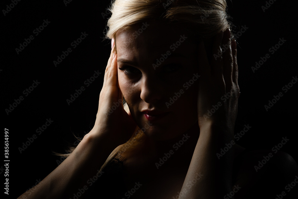 Fototapeta premium silhouette of women on black background