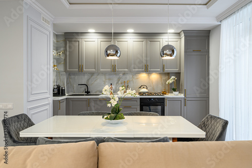 Grey and white luxury kitchen in modern style photo