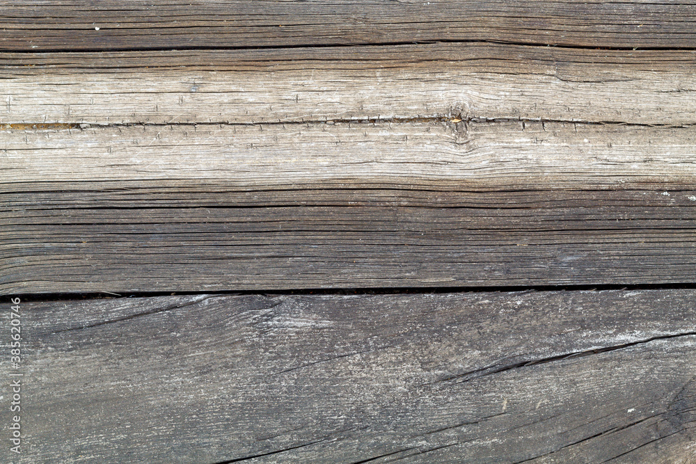 Old Weathered Cracked Grayish Wood Texture Useful For Backgrounds and Overlays