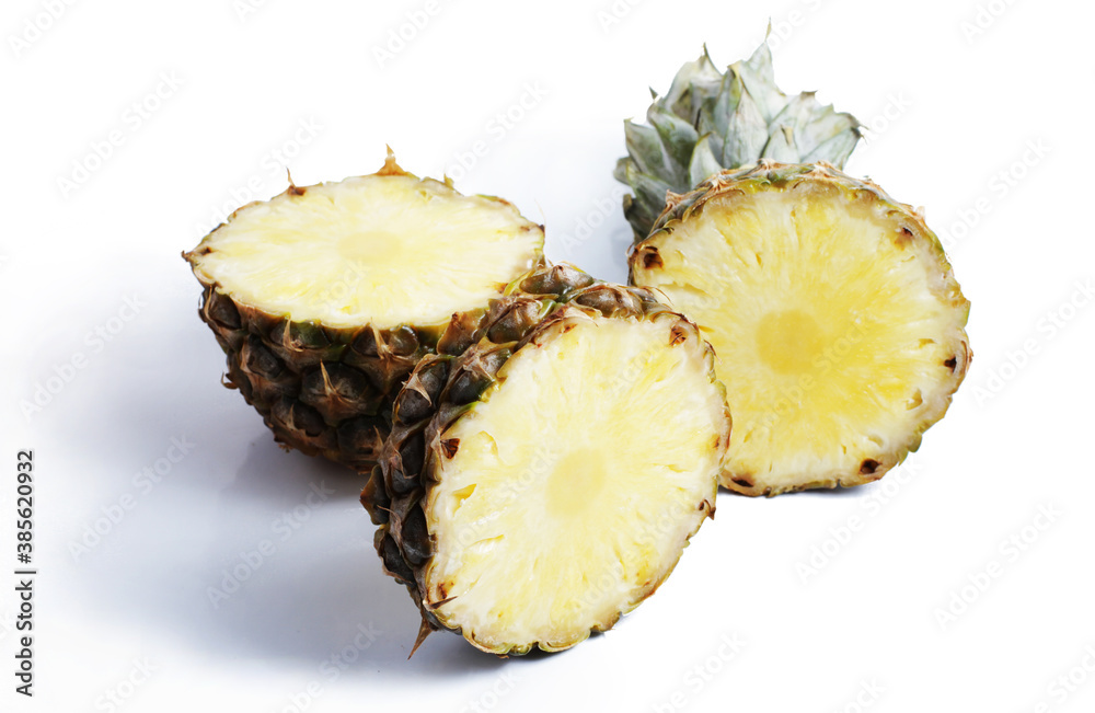 Fresh pineapple slices with shade. Isolate on a white background. Side view Fresh pineapple slices with shade. Isolate on a white background. Side view
