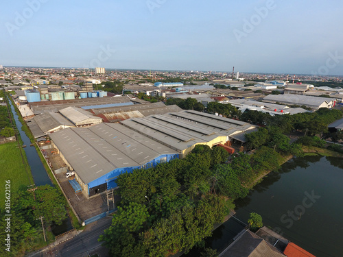 Aerial view of the industrial complex area of Surabaya Industrial Estate Rungkut (SIER) Surabaya, Indonesia, in the middle of a densely populated residential area in the Rungkut area, Surabaya City photo