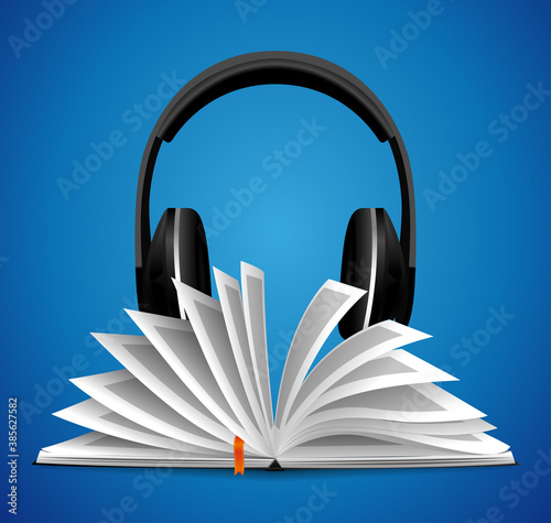 Audiobook concept - opened book with headphones