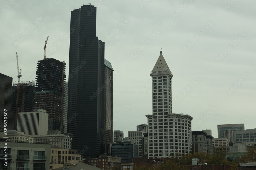 Seattle city skyscrapers. Modern architecture. High commercial buildings. Cloudy day.