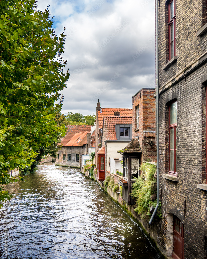 Historic Buildings along he Canals of the Medieval City of Bruges in Belgium