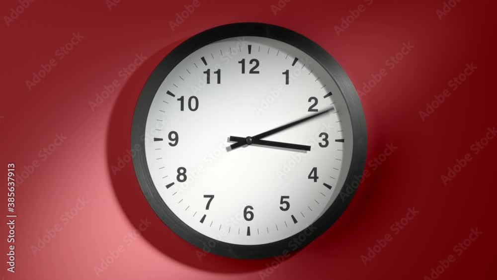 Clock Face in Time Lapse on Red Burgundy Cherry Wall in Office Clock Face in Time Lapse on Red Burgundy Cherry Wall in Office