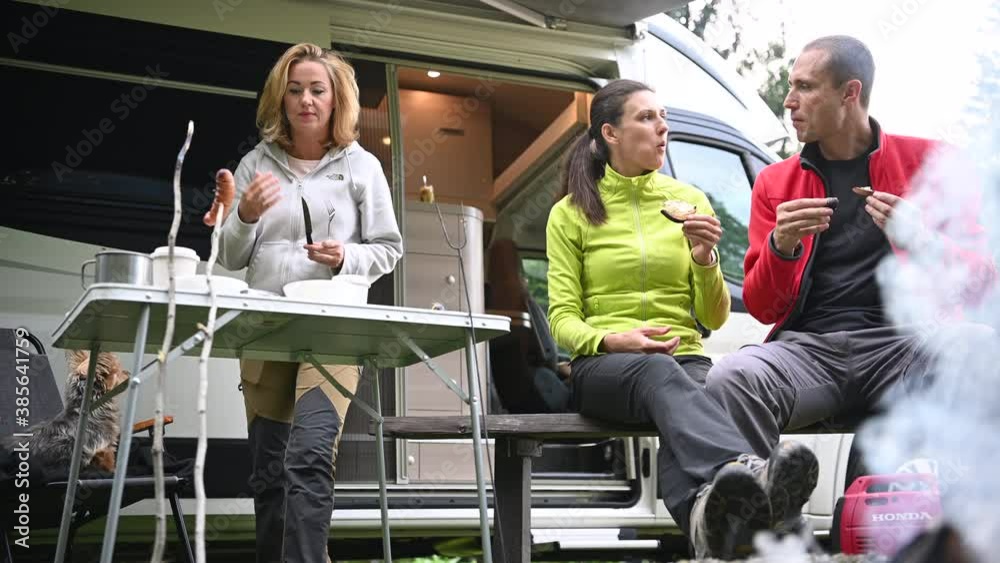 Caucasian Friends and Their Camper Van Trip to the Wilderness. Caucasian Friends and Their Camper Van Trip to the Wilderness.