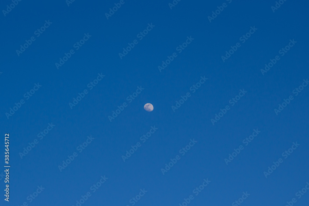 Moon in the sky during the day time Moon in the sky during the day time