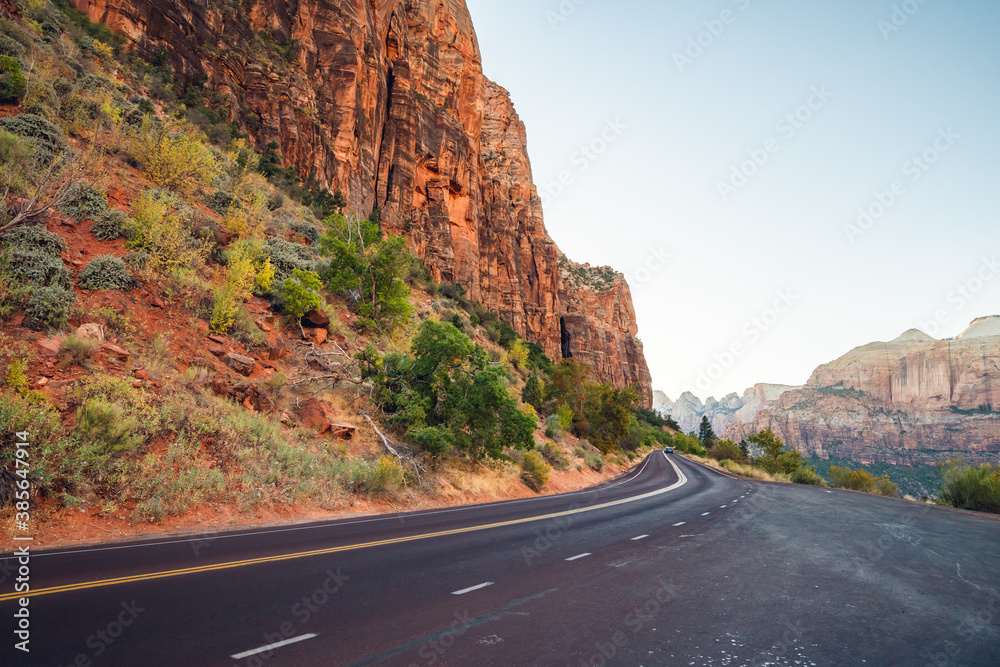Scenic curved red rock asphalt road in Zion National Park, Utah Scenic curved red rock asphalt road in Zion National Park, Utah