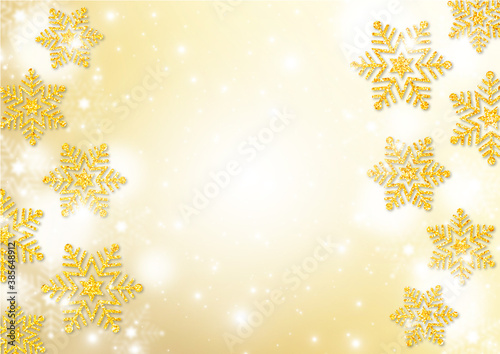 金色のラメの雪の結晶と綿雪 金色のグラデーション背景 ふわふわの白いドット 冬の背景素材