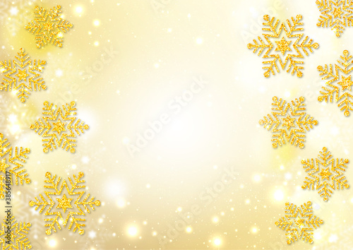 金色のラメの雪の結晶 光る綿雪 金色のグラデーション背景 ふわふわの透明なドット 冬の背景素材