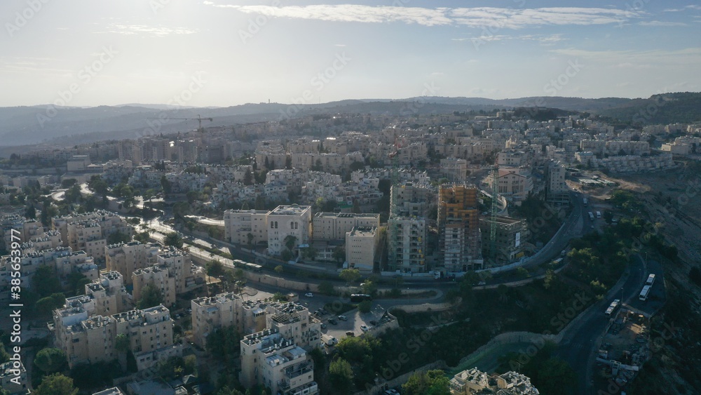 Fototapeta premium Jerusalem orthodox neighborhood Ramot Alon Aerial view Drone Image of Israeli settlement in northwest East Jerusalem 
