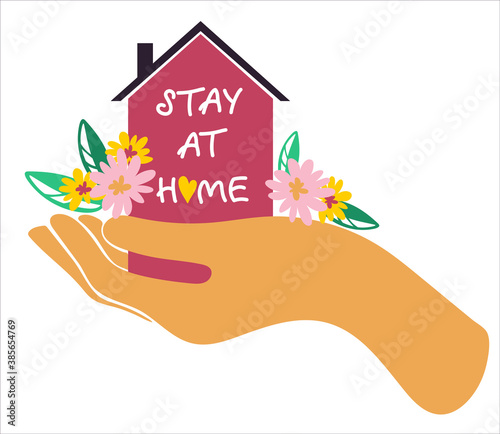 Man holds house in his hand. Stay at home lettering. Isolate on white background. Ncov 2019 coronavirus pandemic 
quarantine. Cartoon style