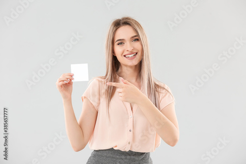 Young woman with small blan...