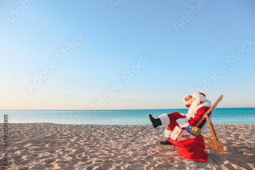Santa Claus resting at sea ...