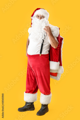 Santa Claus on color backgr...