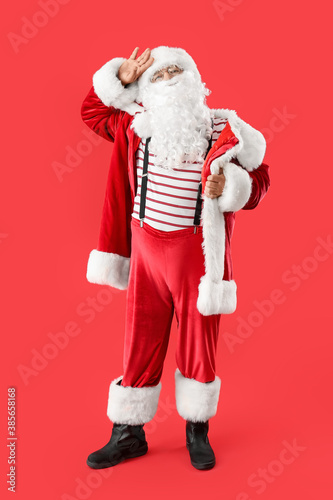 Santa Claus on color backgr...